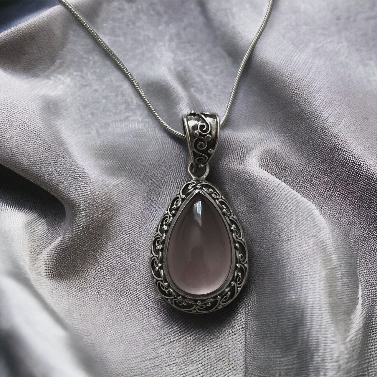 Authentic Rose Quartz teardrop/statement Pendants/sterling silver